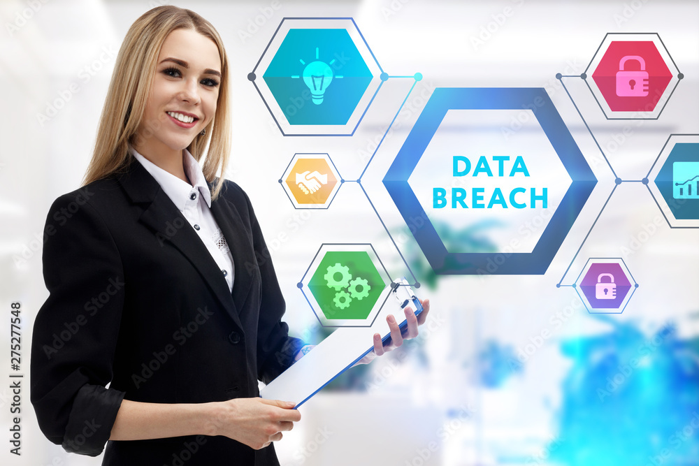 The concept of business, technology, the Internet and the network. A young entrepreneur working on a virtual screen of the future and sees the inscription: Data breach The concept of business, technology, the Internet and the network. A young entrepreneur working on a virtual screen of the future and sees the inscription: Data breach