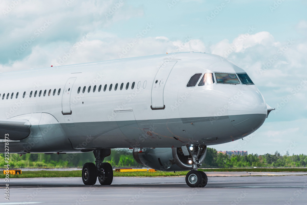 Airplane is taxiing on the runway before departing flight. Airplane is taxiing on the runway before departing flight.