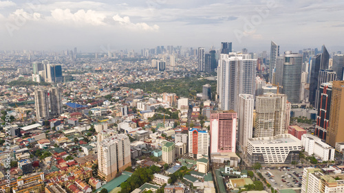 Modern city. The city of Manila  the capital of the Philippines. Modern metropolis in the morning  top view. Modern buildings in the city center.