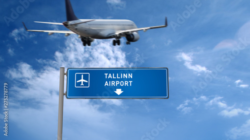 Plane landing in Tallinn with signboard