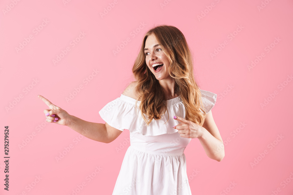 Beautiful young blonde girl wearing summer dress Beautiful young blonde girl wearing summer dress