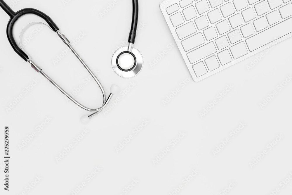 Stethoscope, Top view of doctor's desk table, blank paper on white background, above view doctor work tools on white, Stethoscope, laptop, eyeglass and medical drug on white background, Stethoscope, Top view of doctor's desk table, blank paper on white background, above view doctor work tools on white, Stethoscope, laptop, eyeglass and medical drug on white background,