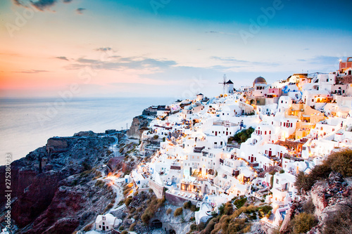 amazing view of Oia town at sunset in Santorini, Cyclades islands Greece - amazing travel destination