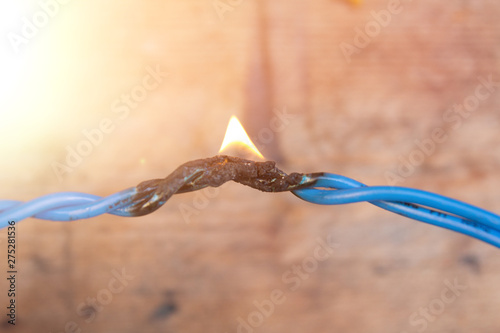 Wallpaper Mural Short circuit, burnt cable. Fire. fault condition. defect Torontodigital.ca