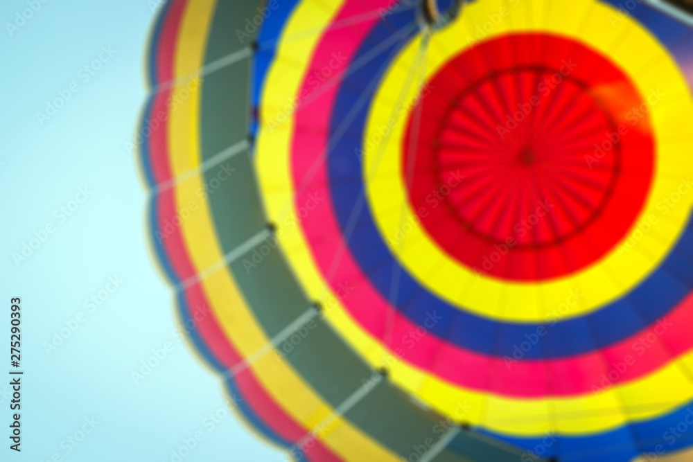 Obraz premium Blurred image for colorful background of hot air balloon is flying on blue sky