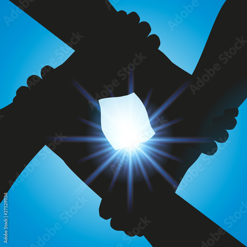 Concept de la solidarité et de l’amitié, avec quatre bras entrelacés qui symbolisent la fraternité et le partenariat, devant un soleil couchant.