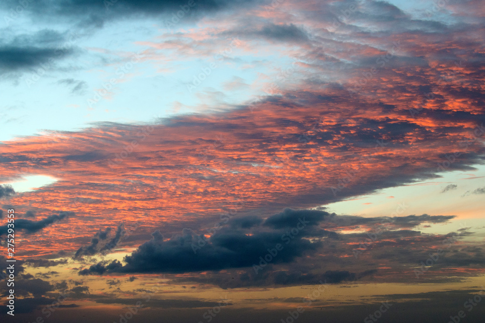 Sunset with blue sky, grey and pink clouds in Florida Sunset with blue sky, grey and pink clouds in Florida