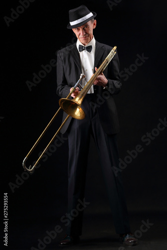 Photography Growth portrait of an elderly musician with a trombone
