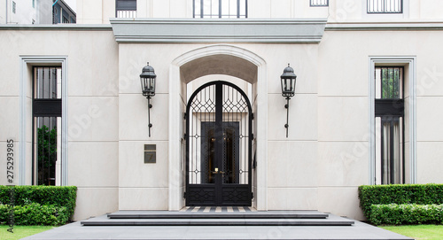 The main entrance to the Elegant luxury building.  © Pornpawit