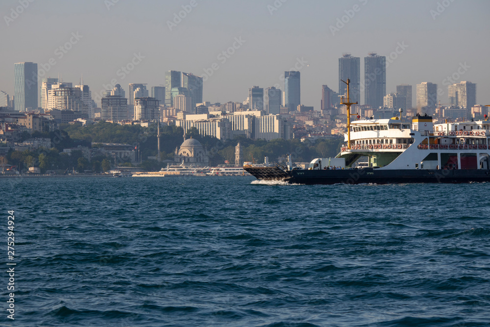 Ortakoy mosque view from the sea. Blurred water drops in front of the image.