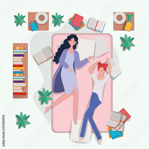 young women relaxing in mattress in the bedroom