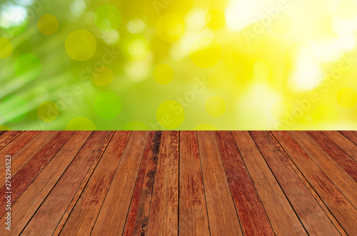 Wood plate table Green Background Bokhe