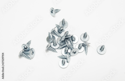 Fototapeta Naklejka Na Ścianę i Meble -  threaded screws made of steel, metal, iron, chrome, wooden screw. isolated on white background