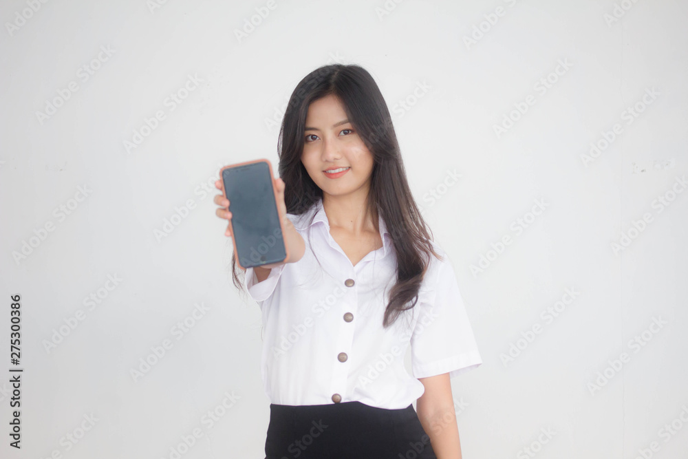 Portrait of thai adult student university uniform beautiful girl show her smart phone Portrait of thai adult student university uniform beautiful girl show her smart phone