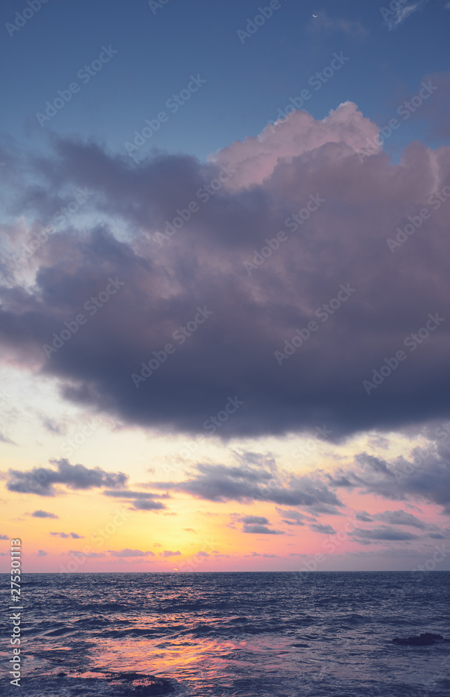 Fototapeta premium Landscape. Sunset over the sea