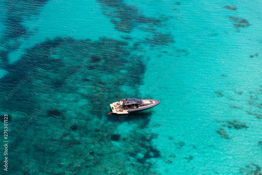 Fototapeta premium inflatable motor boat in formentera, spain