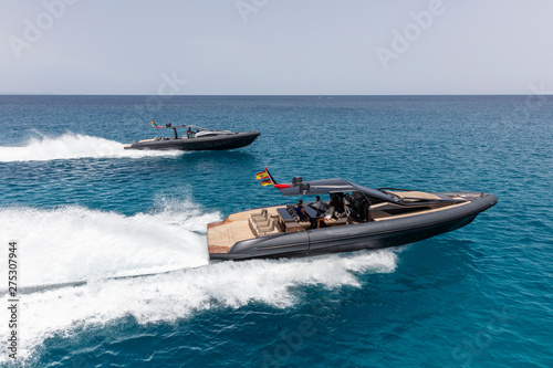 Obraz na płótnie inflatable motor boat in formentera, spain w salonie