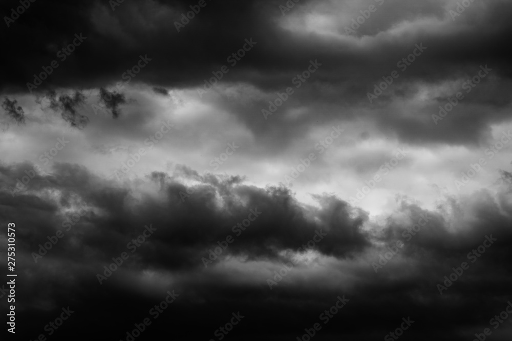 Black and white storm clouds before the rain, dramatic sky Black and white storm clouds before the rain, dramatic sky