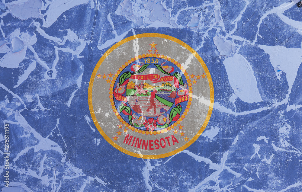 The national flag of the US state Minnesota in against a gray wall with cracks and faults on the day of independence in blue red and yellow. Political and religious disputes, customs and delivery.