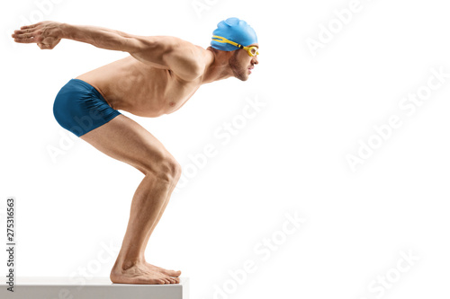 Fit male swimmer waiting to jump