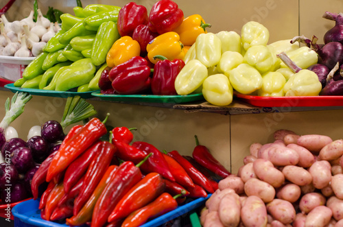 big choice of fresh fruits and vegetables on market counter