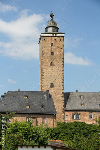 Steeple with background blue sky and little clouds in Steinau in Germany