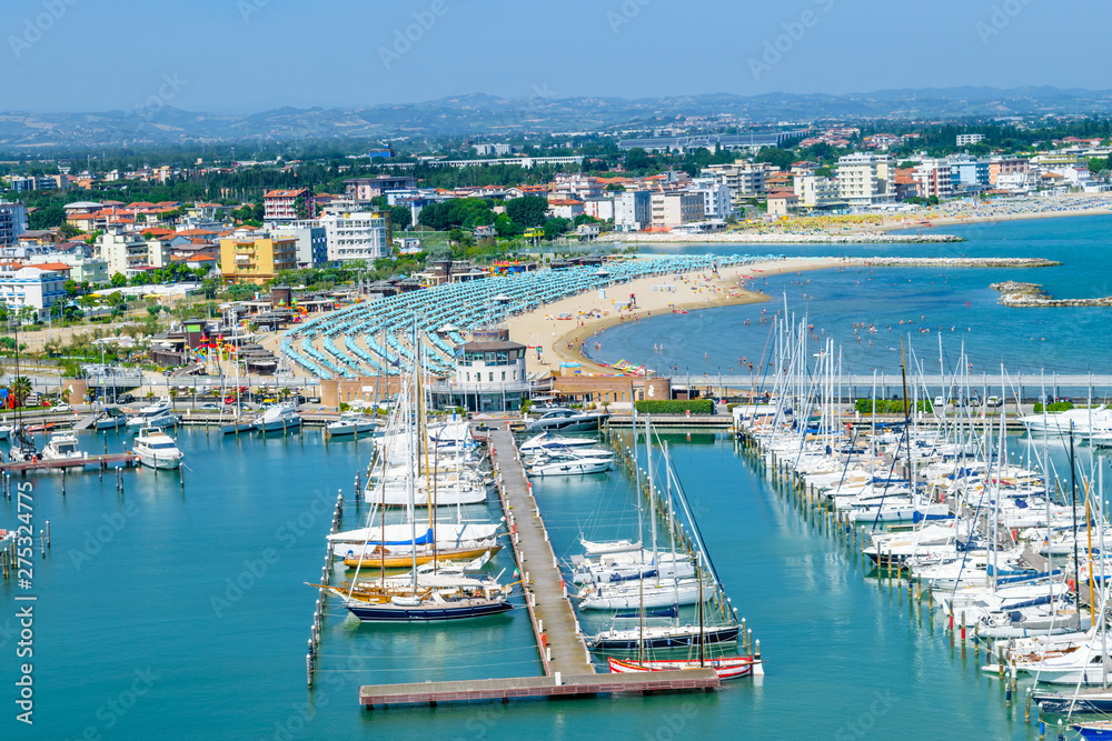 Aerial view of Rimini beach and docks in Italy