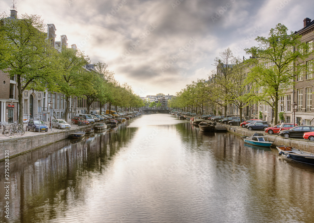 Boats in a Tree Lined Canal Boats in a Tree Lined Canal