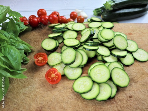 courgettes sliced with cherry and herbs