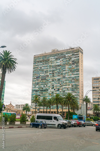 Cars parked in front of a big office building on the Independance square  Plaza Indepencia   Montevideo  Uruguay  January 25th 2019