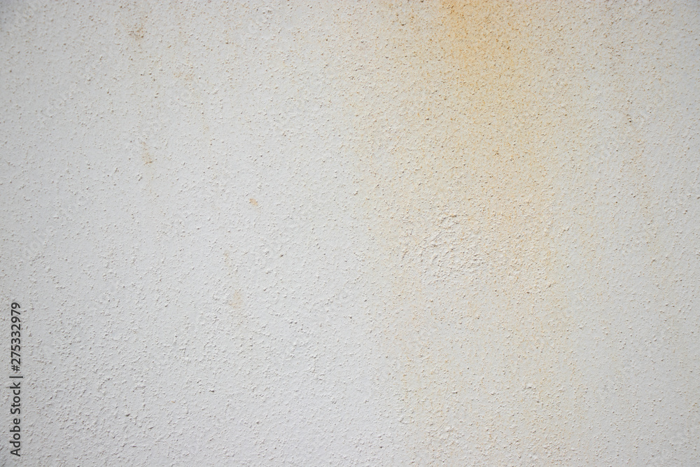 Beige painted grunge wall rough texture