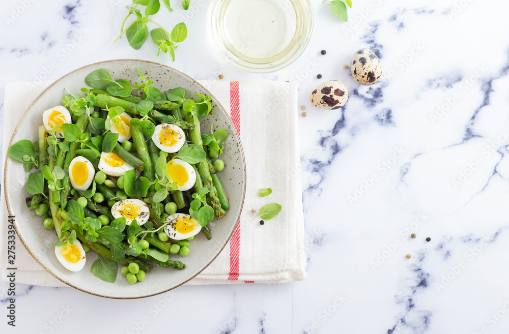 salad with quail eggs and asparagus for summer menu
