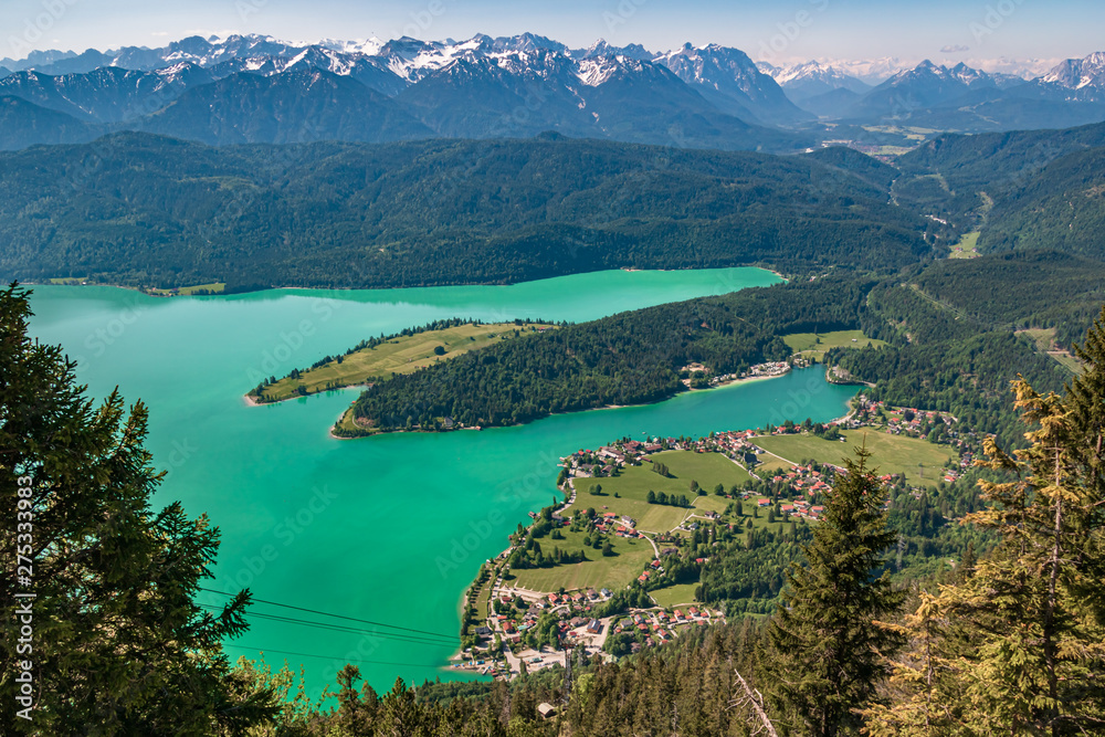 Beautiful alpine view of the Walchensee with emerald-green water at the Herzogstand summit - Bavaria - Germany