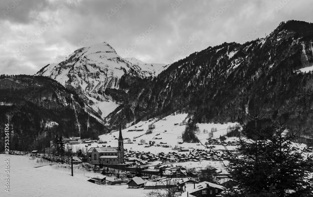 black and white view of Lungern on a beautiful winter day