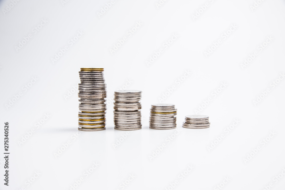 Increasing columns of gold and silver coins, business finance concept, isolated on white background
