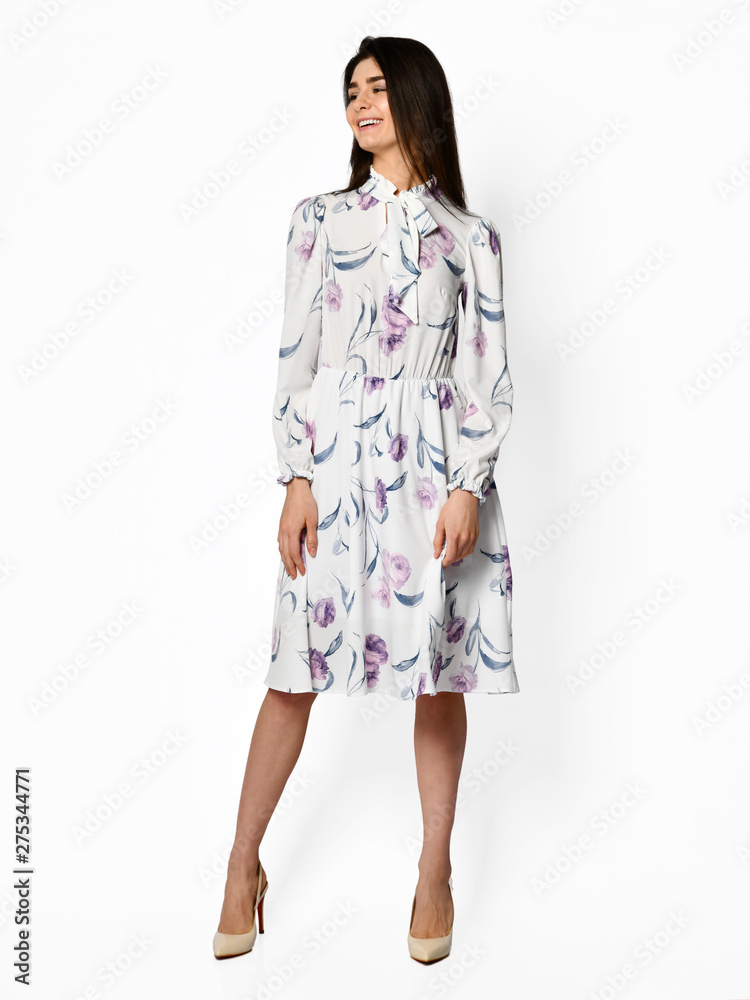 Young beautiful woman walking in new design casual summer long dress full body on white Young beautiful woman walking in new design casual summer long dress full body on white