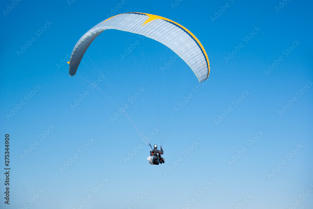 Skydivers competition. Parachutes against the blue sky. Skydivers competition. Parachutes against the blue sky.