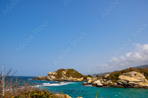 beautiful tropical sea bay with blue ocean in the exotic Tayrona National Park Colombia