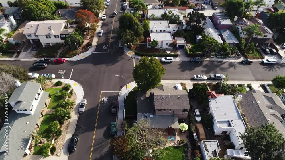 Tilt up aerial, coastal neighborhood in San Diego