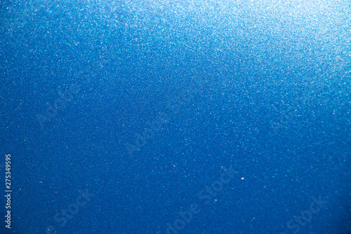 Blue glitter metal car finish texture background