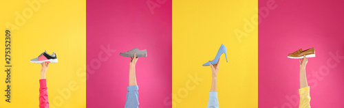 Woman holding sportive shoe on yellow background, closeup. Space for text photo