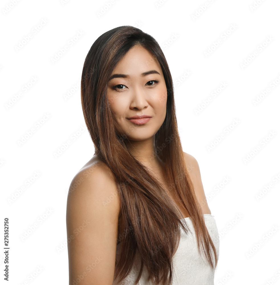 Portrait of beautiful Asian woman wrapped in towel isolated on white. Spa treatment Portrait of beautiful Asian woman wrapped in towel isolated on white. Spa treatment