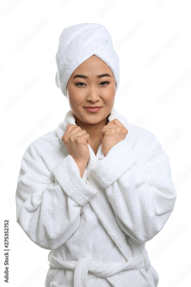 Portrait of beautiful Asian woman in bathrobe isolated on white. Spa treatment Portrait of beautiful Asian woman in bathrobe isolated on white. Spa treatment