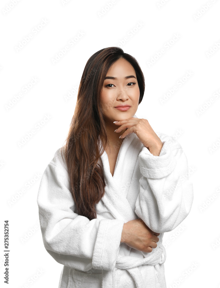 Portrait of beautiful Asian woman in bathrobe isolated on white. Spa treatment Portrait of beautiful Asian woman in bathrobe isolated on white. Spa treatment