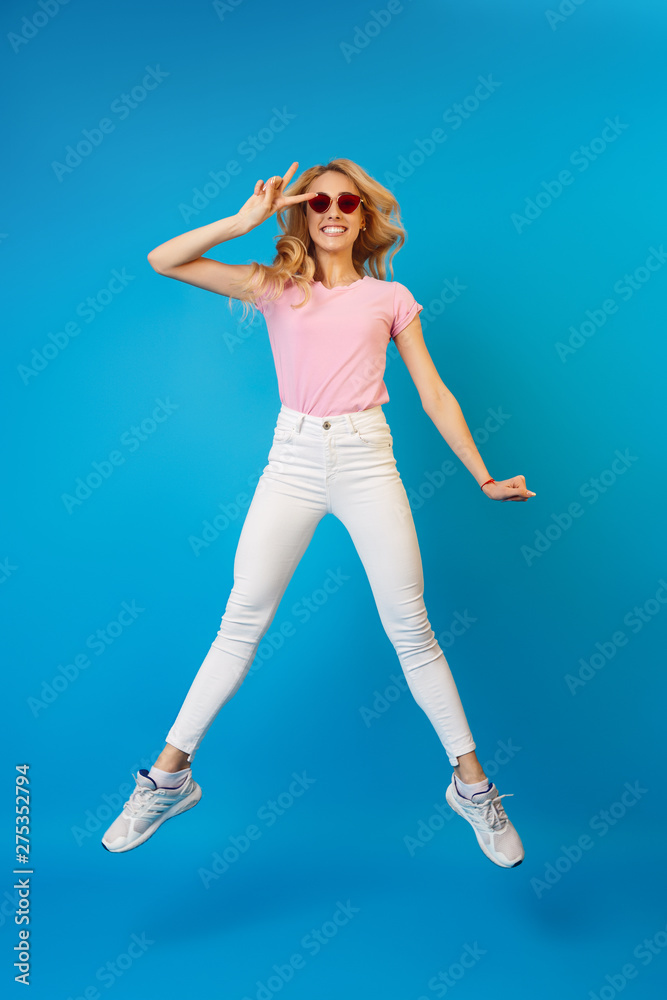 Funny Portrait of Young Girl In Jump