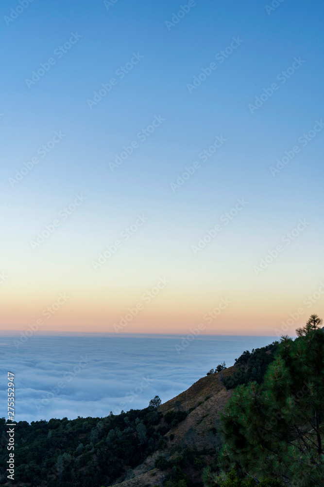Pastel Sunrise over Clouds, Mountain from View