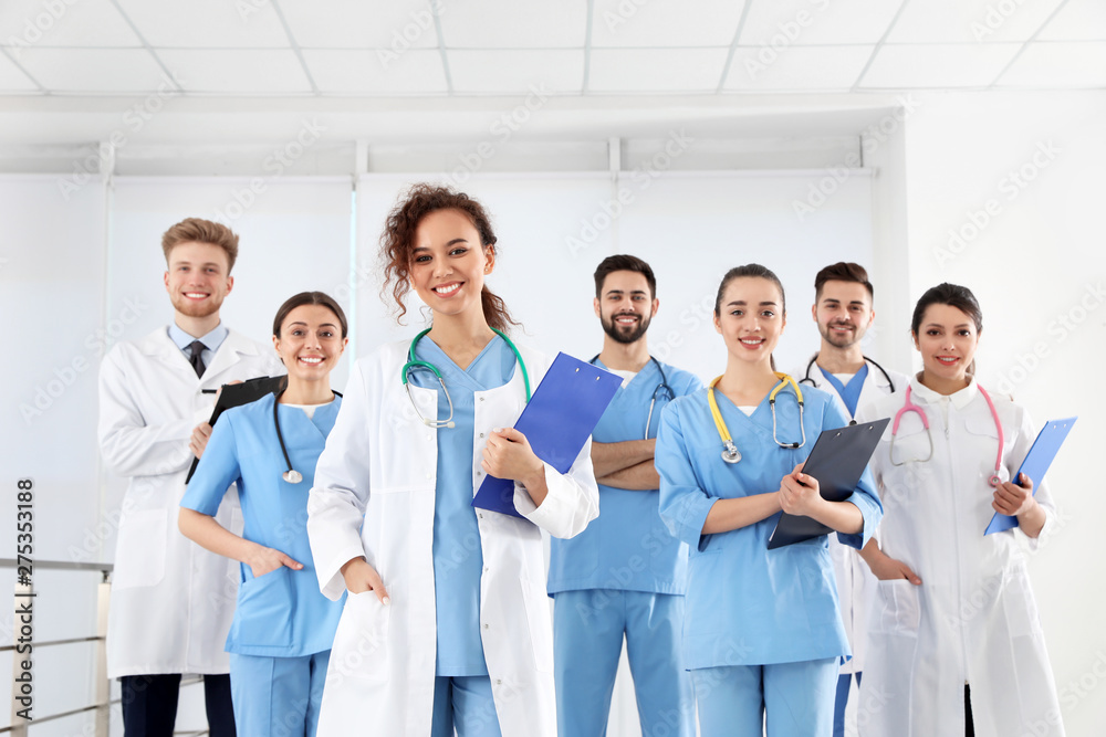Team of medical workers in hospital. Unity concept Team of medical workers in hospital. Unity concept