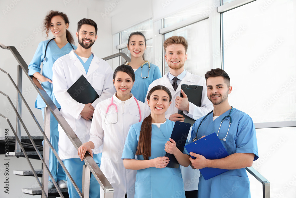Team of medical workers in hospital. Unity concept Team of medical workers in hospital. Unity concept