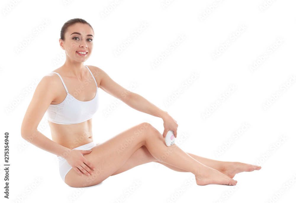 Woman doing leg epilation procedure isolated on white Woman doing leg epilation procedure isolated on white