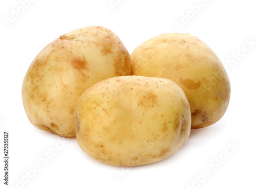 Delicious young raw potatoes isolated on white